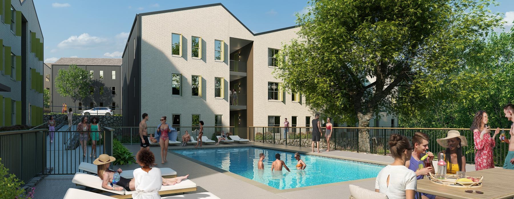 a group of people sitting around a pool